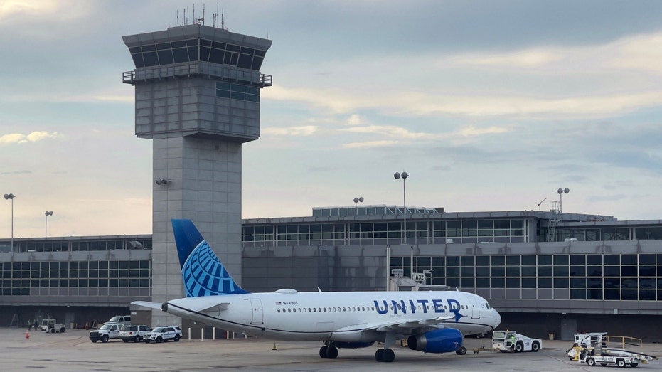A United Airlines Airbus 320-232 is seen parked at Dulles Washington International Airport