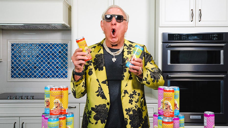 Ric Flair reacts with Wooooo! Energy Drinks