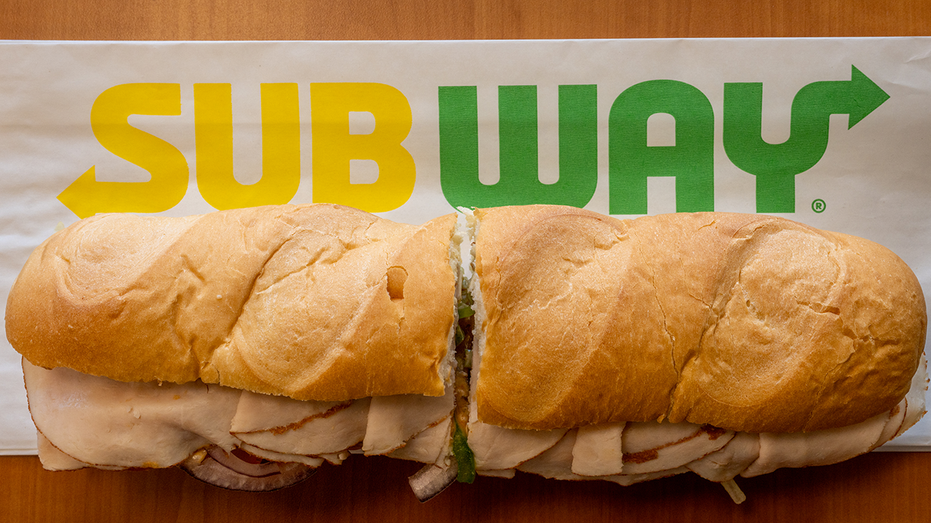 Subway sandwich on top of a Subway napkin with a logo